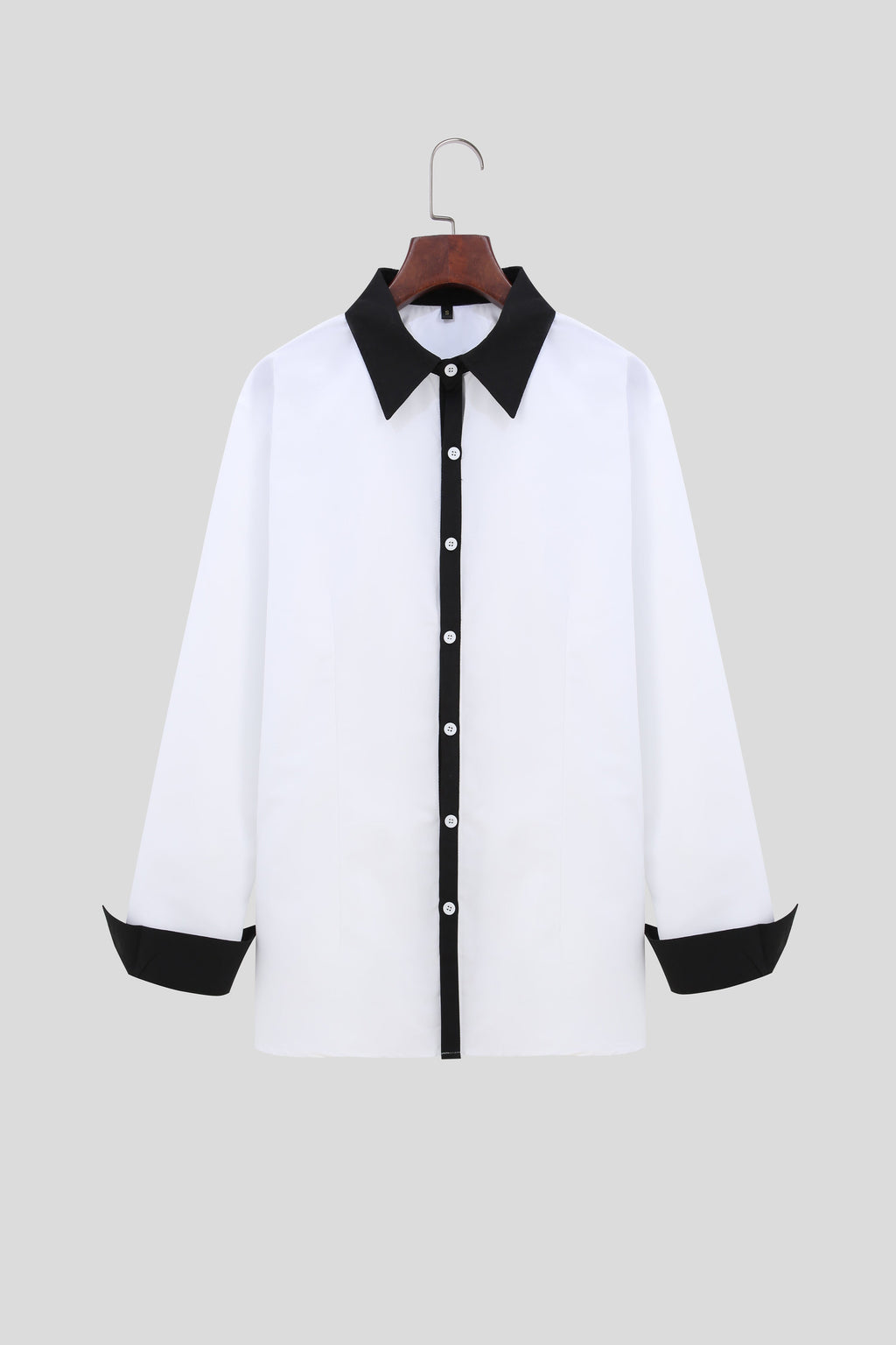 A Handsome Business And Fashionable Long-sleeved Shirt With Contrasting Colors For A Teenage Man