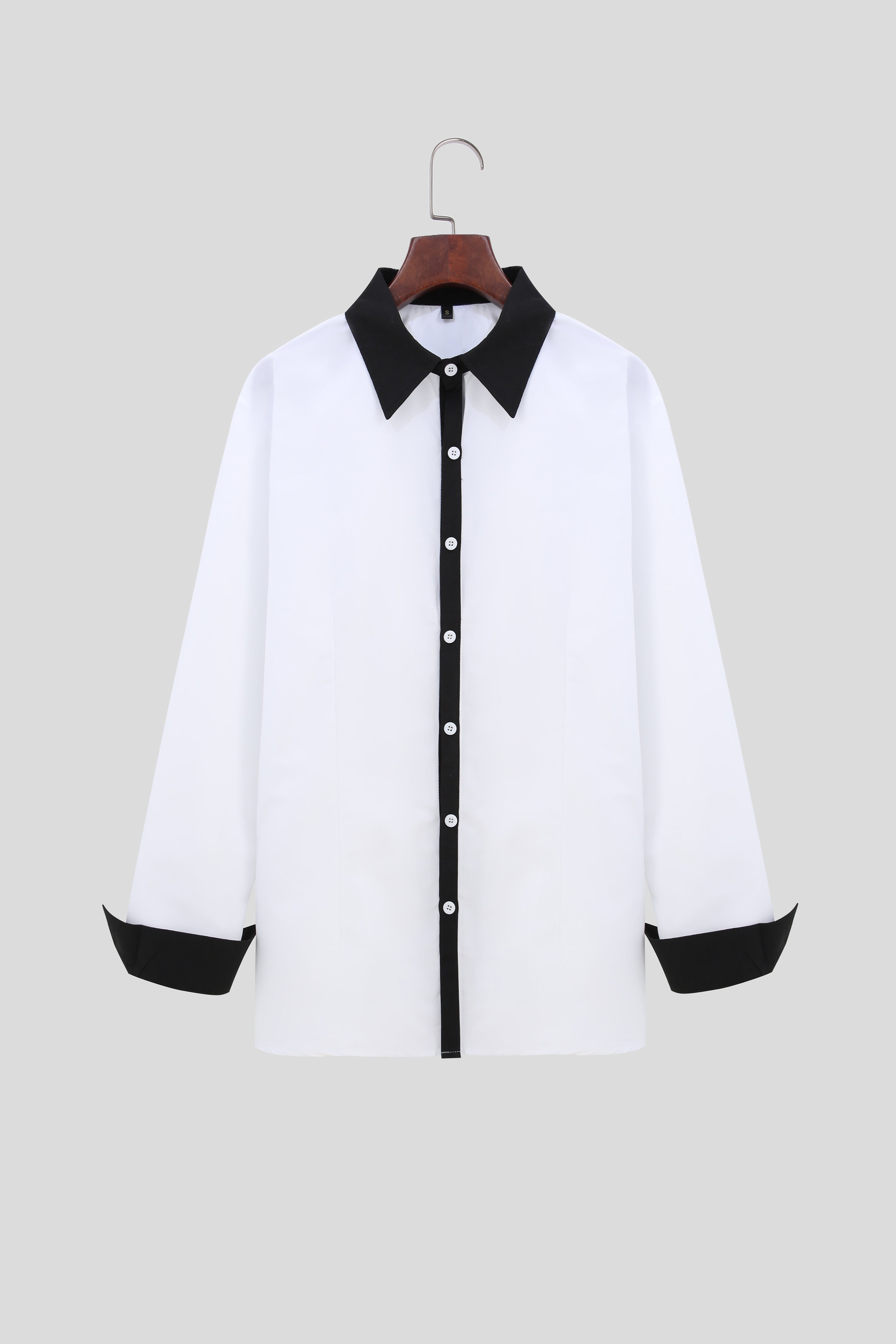 A Handsome Business And Fashionable Long-sleeved Shirt With Contrasting Colors For A Teenage Man